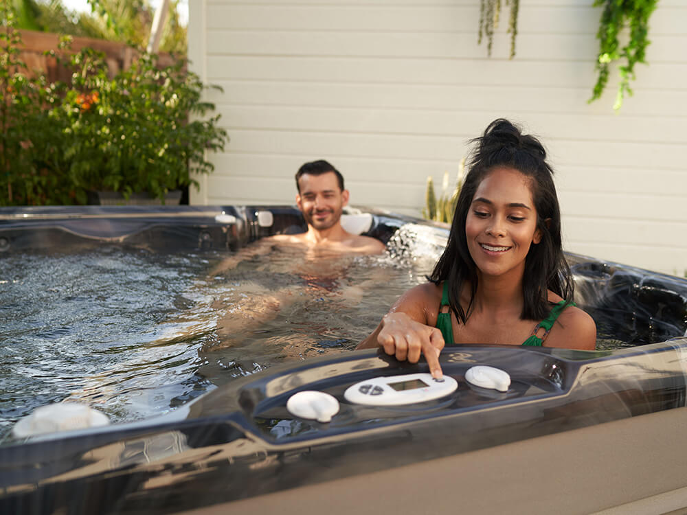 A couple relaxing in a Caldera Vacanza Vanto spa