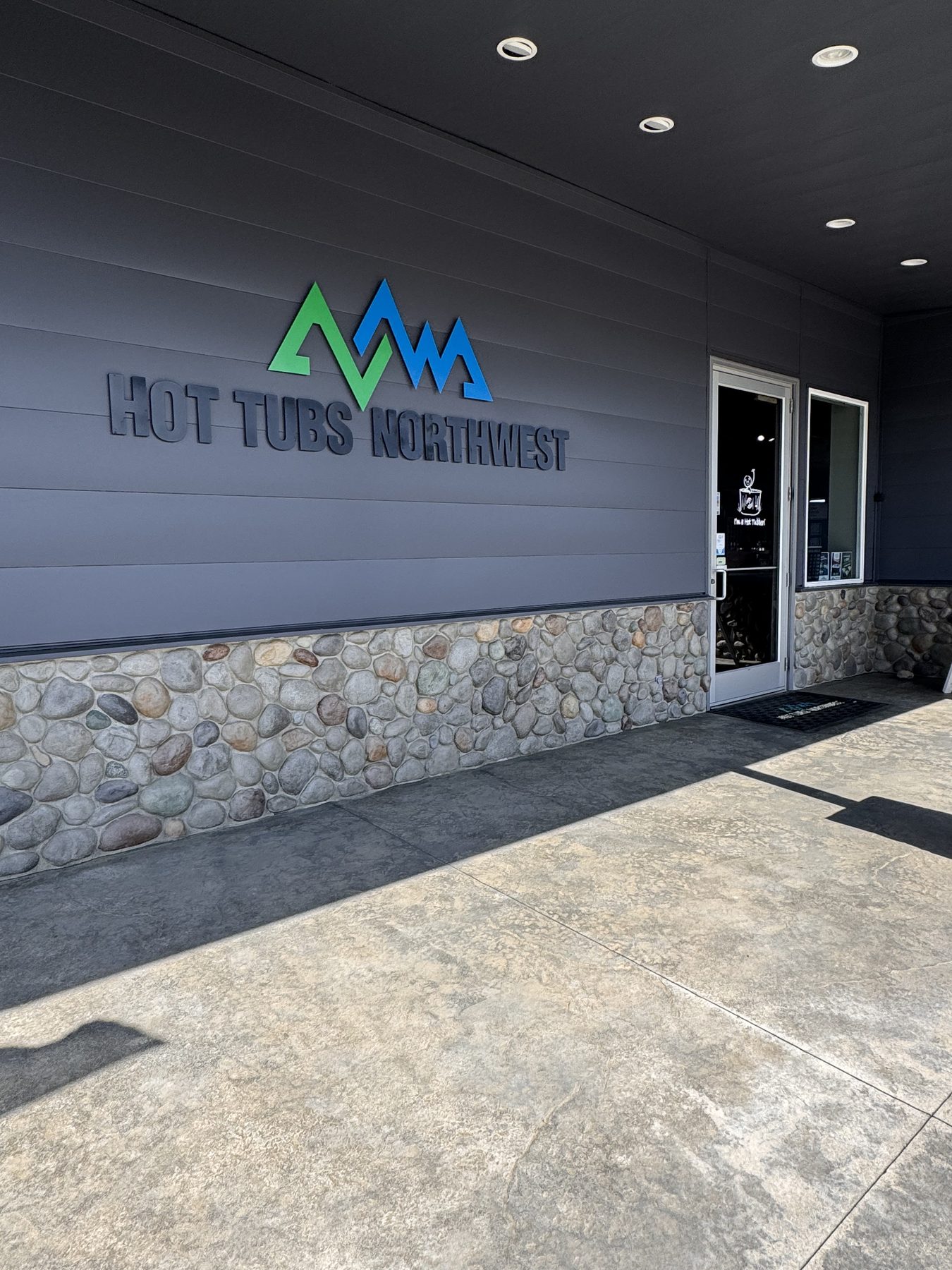 Hot Tubs Northwest sign at the Burlington showroom