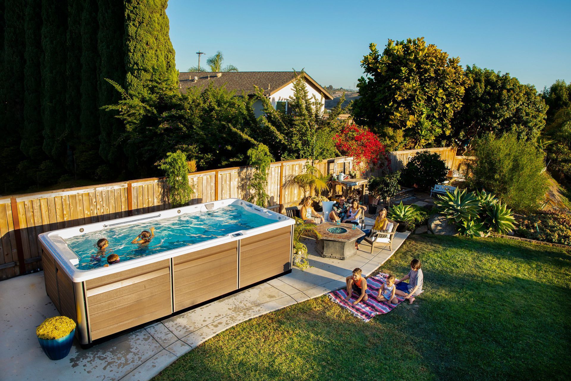 People enjoying an Endless Pools swim spa