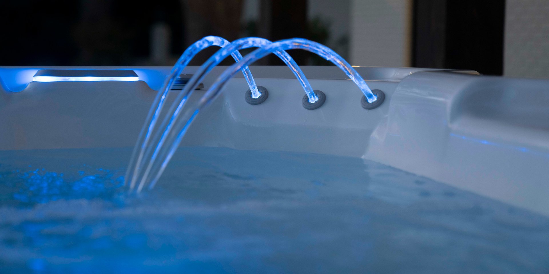 Water feature on a Hot Spring Highlife Vanguard spa in Alpine White and Java